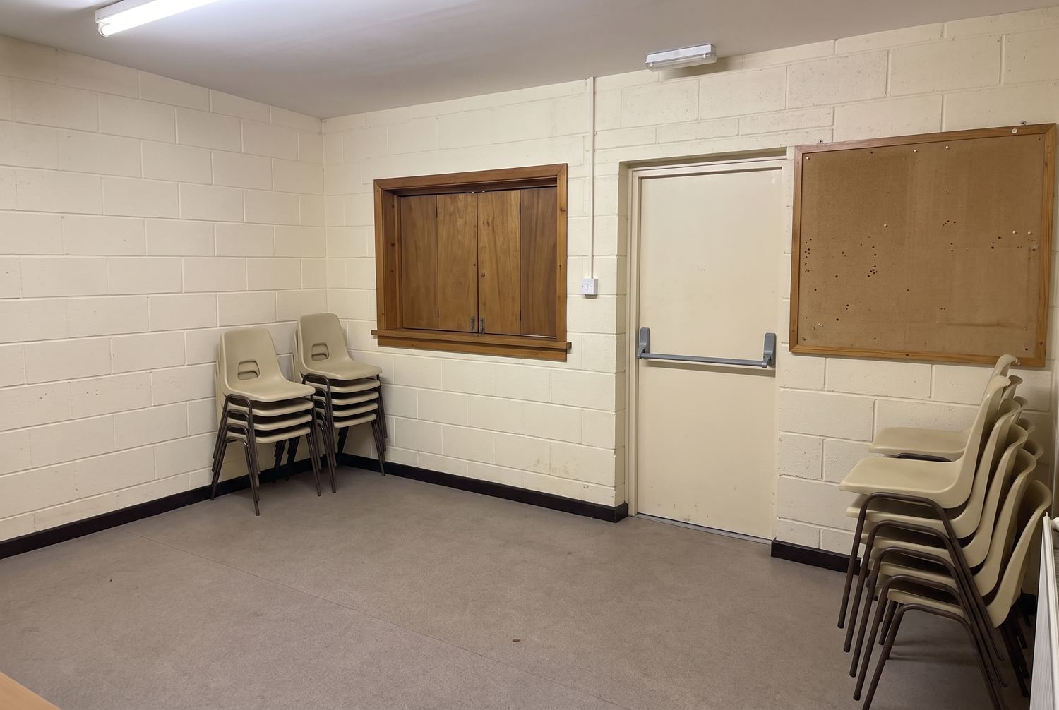 The inside of the clubhouse, from the far corner, towards the bar.