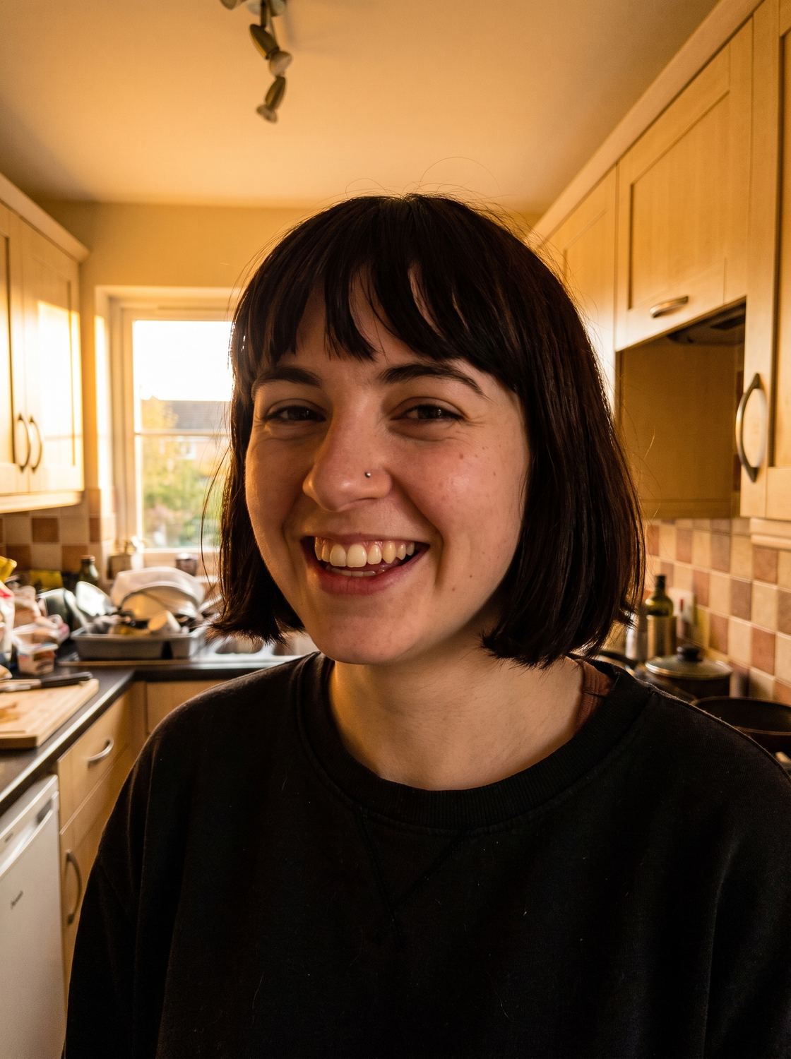 Ellie, one of four friends, seen against a kitchen wall.