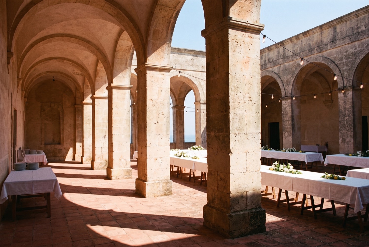 Along the shaded colonnade